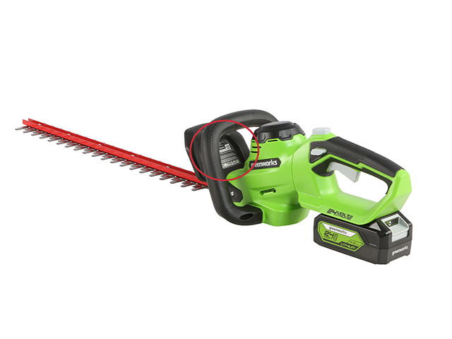 Hedge trimmer label location on plastic guard