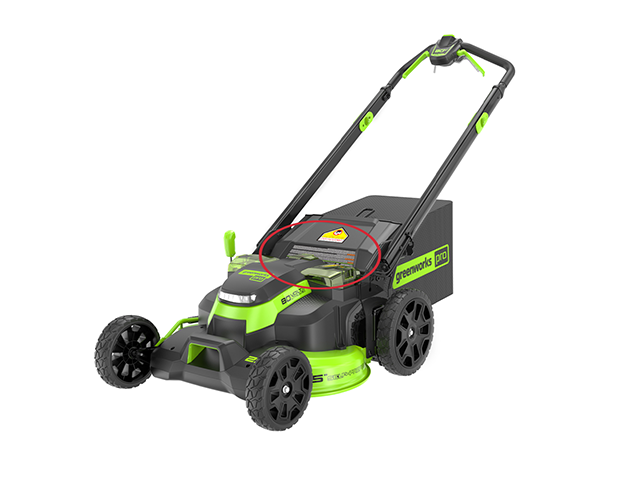 Lawn mower label location near back flap
