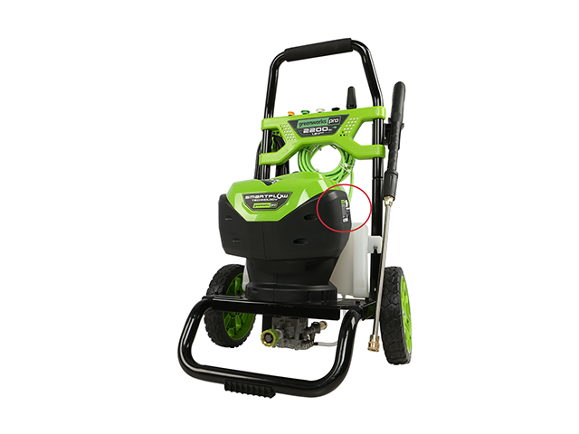 Pressure washer label location on side of base