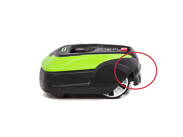 Robotic mower label location at back near bottom below handle